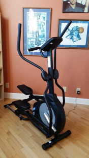 Photo of an elliptical in a home gym
